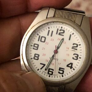Silver and White Practical Wristwatch with Bold Numerals and Textured Band